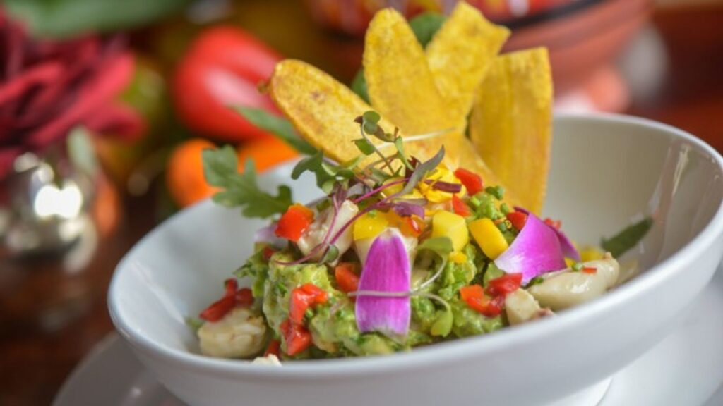 A plate of food with corn, flowers, and other vegetables at the Arabella Hotel in Sedona.