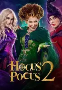 Three witches in colorful costumes pose together at Arabella Sedona, with Hocus Pocus 2 written at the bottom in glowing gold letters.